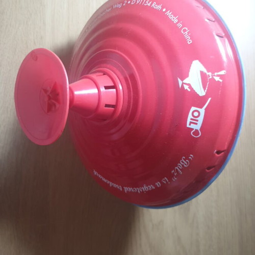 Metal spinning top like new with circus animal design