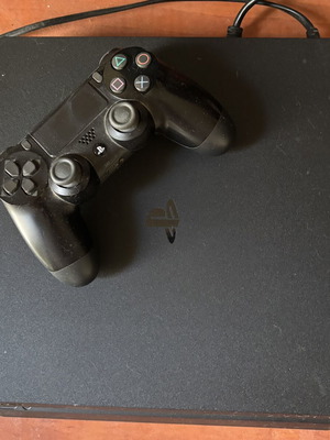 PlayStation 4 Slim 1TB with controller and 5 games like new