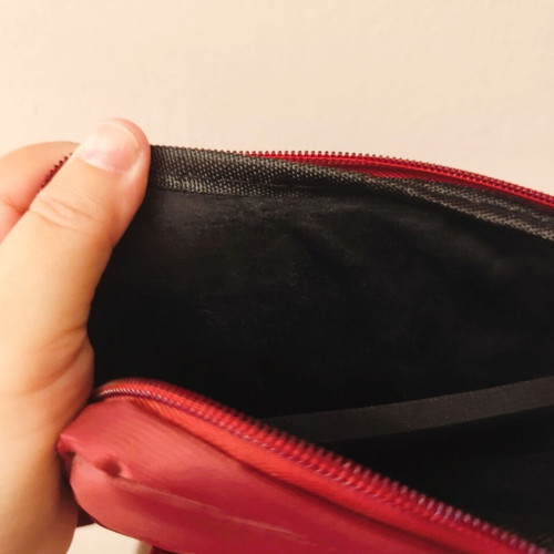 Waterproof red shoulder and hand bag for tablet