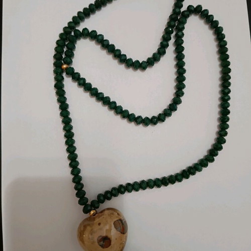 Necklace like new with green beads and large heart