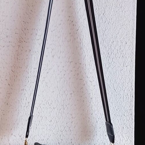 Black shoulder bag with lion design and rose gold details new