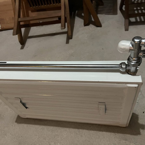 Used two-column radiator 60x40 cm with new switch and metal pipe