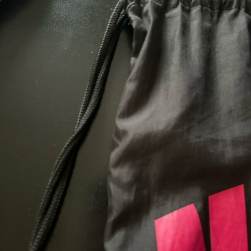Nike backpack like new with fuchsia print black and pink