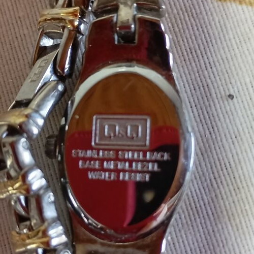 Wristwatch women's like new, gold and silver tones