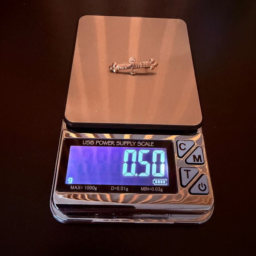 Gold baby pin 12K 0.50g like new, newborn amulet