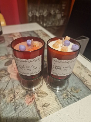 Handmade scented candle vanilla in burgundy glass