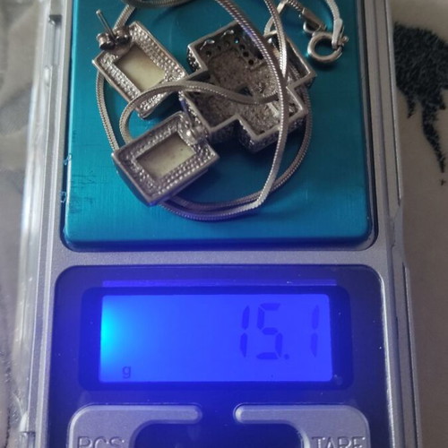 Silver 925 jewelry set like new, earrings and cross pendant