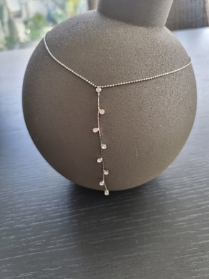 Necklace with hanging chain and stones