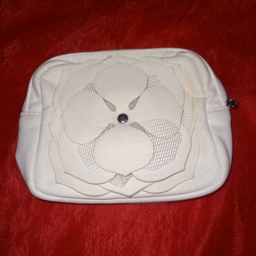 Swarovski and Clarins toiletry bags like new, set of 2 white