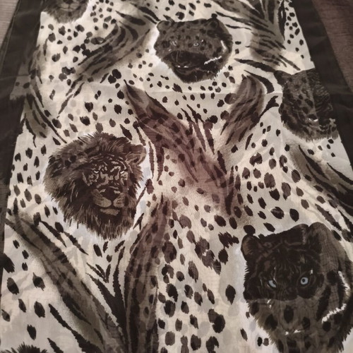 African pareo with wild feline print used, leopard and tiger patterns