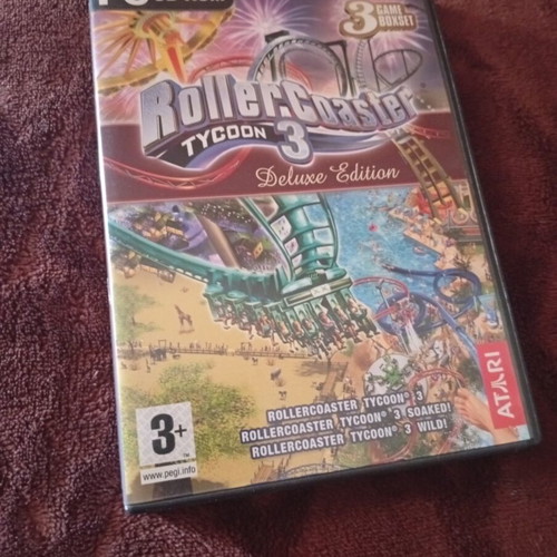 RollerCoaster Tycoon 3 Deluxe Edition game like new