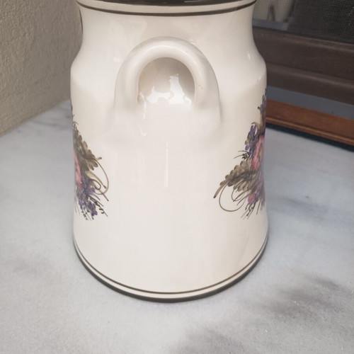 Handmade decorative vase used, painted with flowers