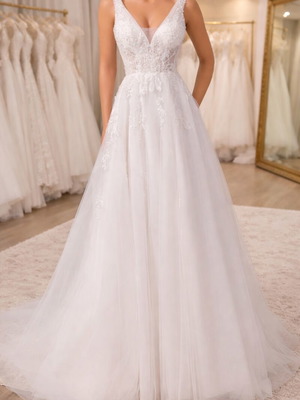 Wedding dress Medium like new with embroidered bust and tulle skirt