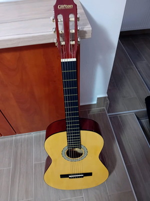Clifton six-string acoustic guitar like new