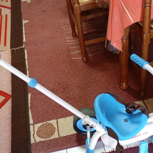 Fisher Price children's bike like new with straps and handle