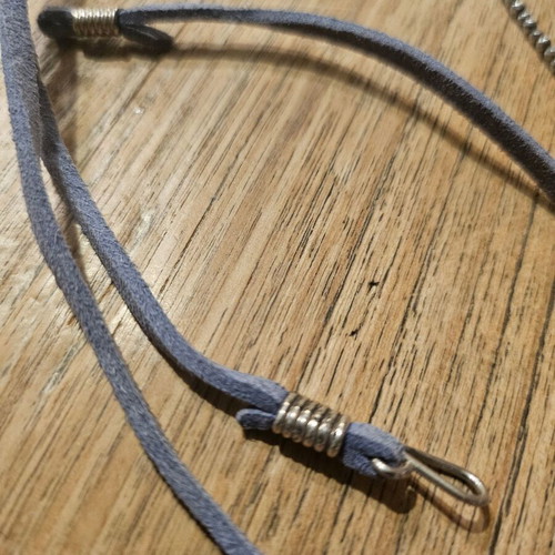 Necklace with leather strap and silver chain like new
