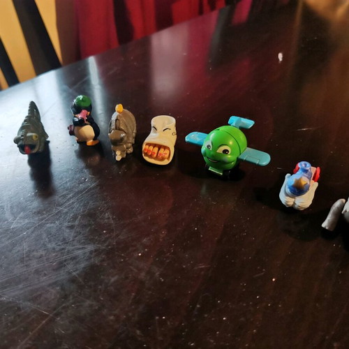 Vintage collection of 41+ used Kinder Surprise toys