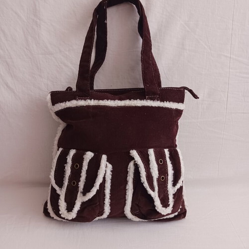 Denim bag like new with fluffy trim, brown