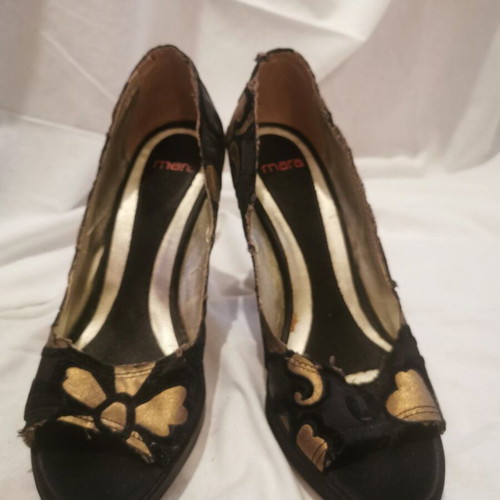 Used women's black pumps size 37