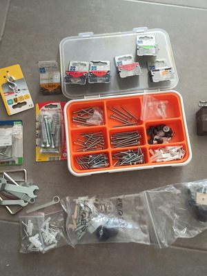 Organization box with screws, wall plugs, metal brackets, nails and accessories new