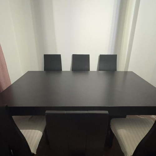 Dining table with set of 6 chairs like new, black, rectangular with extensions
