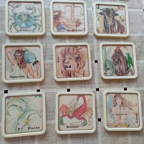 Vintage set of 12 plastic coasters - The 12 zodiac signs