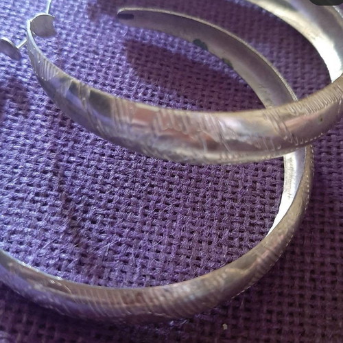 Earrings used large hoops