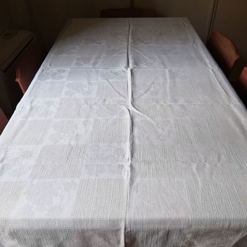 Aegean blue cotton tablecloth with floral woven patterns and lace trim