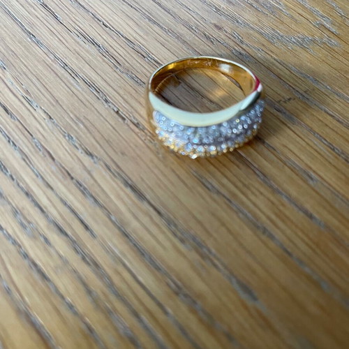 Ring new with two colors gold and silver with zircon unused