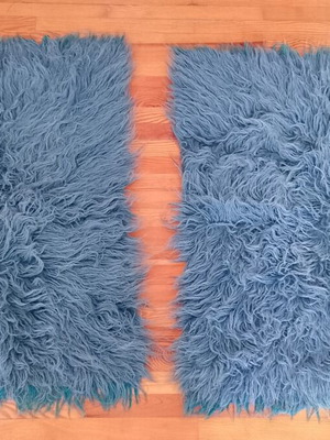 Pair of vintage flokati rugs like new, washed denim blue with teal fringe