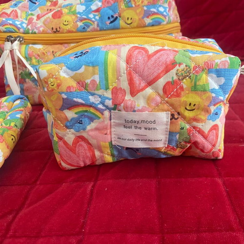 Set of three toiletry bags new, multicolored, various sizes