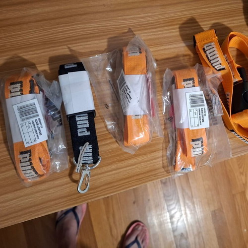Puma keychains new, set of 5, orange and black