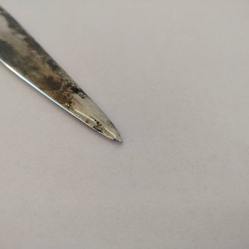 Vintage metal letter opener with unique handle
