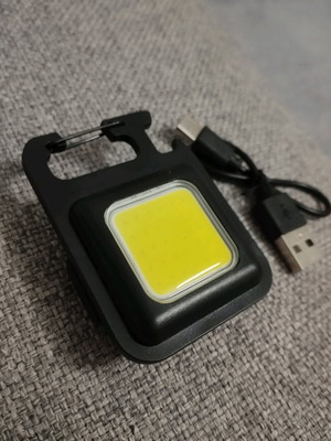 Mini LED Keychain with Three Flashlight Modes, Rechargeable, Magnet, and Opener