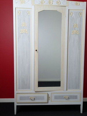 Vintage three-door wardrobe with mirror and floral carvings, used