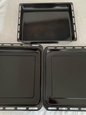 Kitchen baking trays set used, three pieces of various sizes