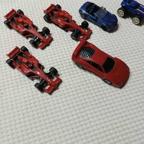 Ferrari toy cars like new, set with magnetic blue car