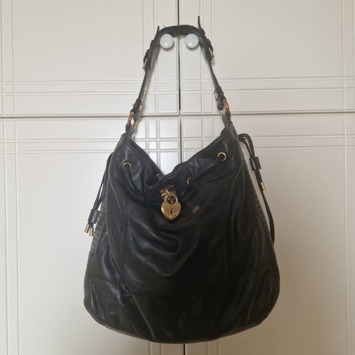 Juicy Couture shoulder bag used, black leather with gold details