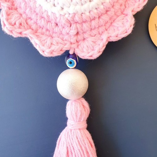 Handmade crochet evil eye in baby pink