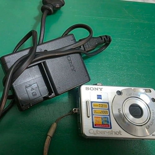 Sony Cyber-shot DSC-W70 digital camera with battery and charger