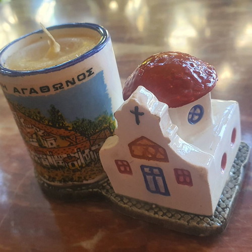 Ceramic church candle holder with candle