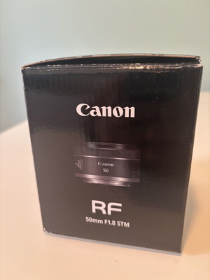 Canon RF 50mm F1.8 STM lens, like new, sealed warranty