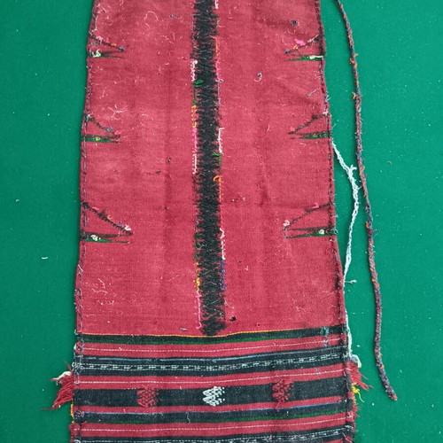 Red striped traditional costume apron used with wear