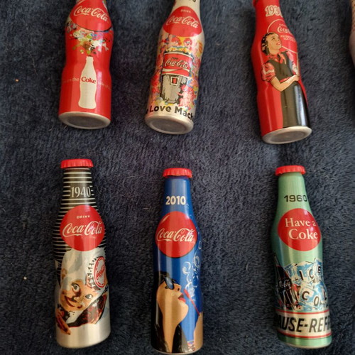 Coca-Cola collectible bottles like new, set of 8 with keychain gift