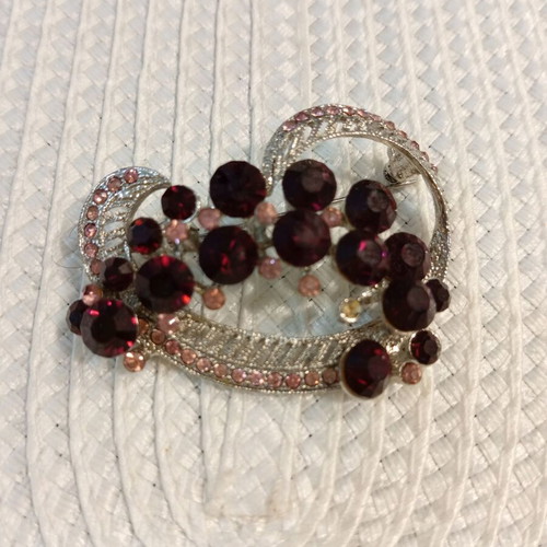 Decorative vintage brooch with lilac and pink crystals, like new