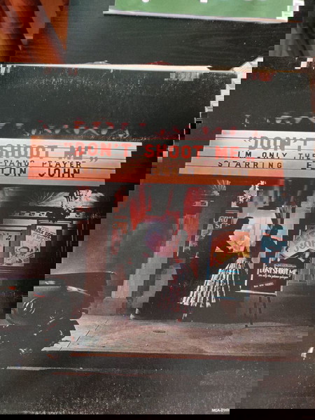 Elton John – “Don’t Shoot Me I’m Only the Piano Player”