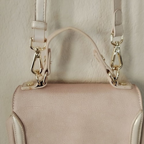 Axel pink shoulder bag used with gold details