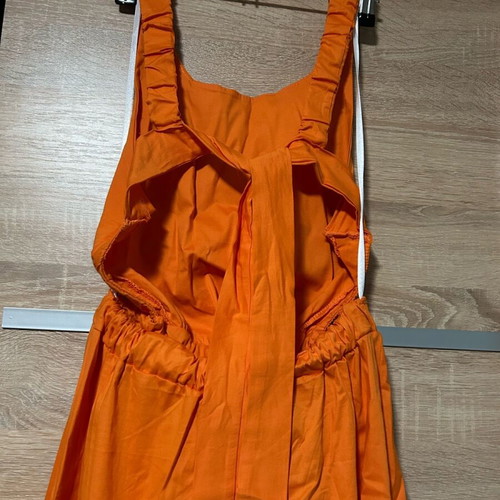 Maxi dress like new, orange, with back opening and bow by De Coro