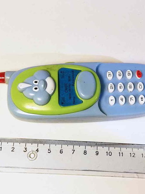 Mobile toy used, broken plastic phone