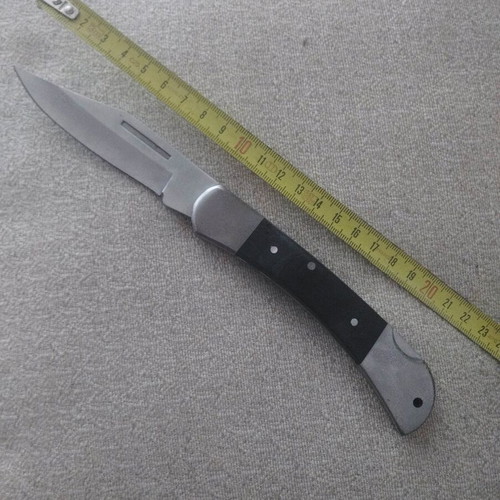 Metal folding knife with stainless blade like new
